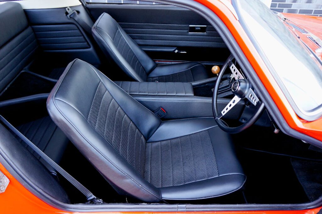 leather-car-seats-in-close-up-photography-5411684 Leather Car Seats in Close-Up Photography