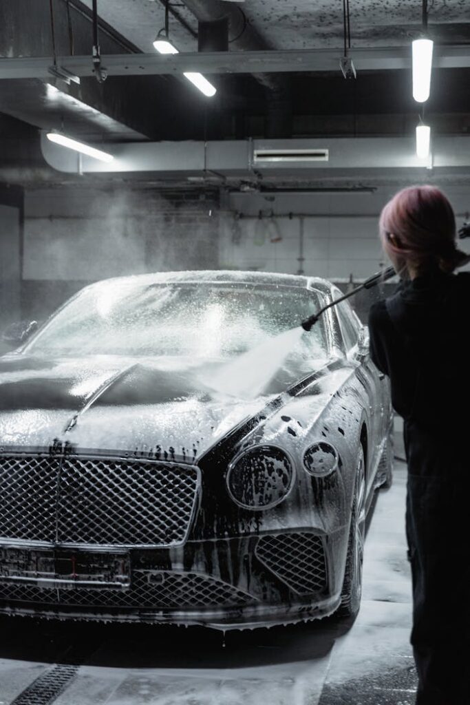 man-in-black-jacket-standing-beside-silver-mercedes-benz-coupe-6872609 Man in Black Jacket Standing Beside Silver Mercedes Benz Coupe