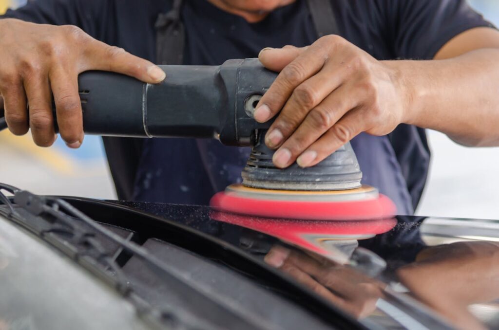 person-holding-a-black-polishing-machine-5233258 Person Holding a Black Polishing Machine